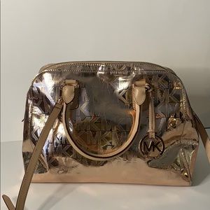 Michael Kors rose gold purse with wallet